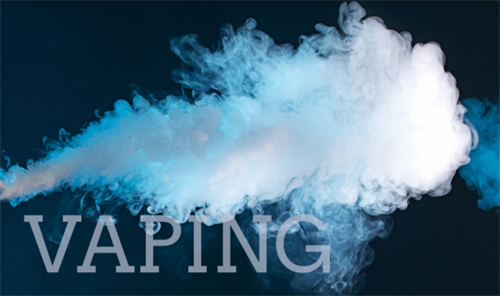 Picture of smoke with text "Vaping"